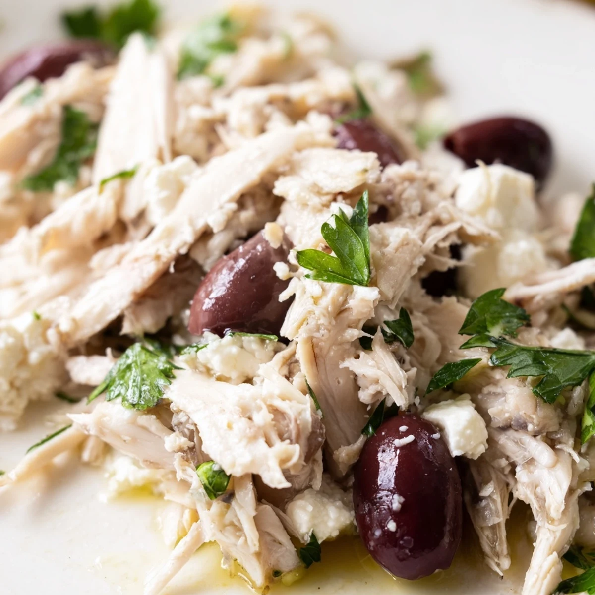 A vibrant bowl of Mediterranean Chickpea Chicken Salad with juicy chicken, creamy feta, and crisp cucumbers tossed in a lemony dressing.  