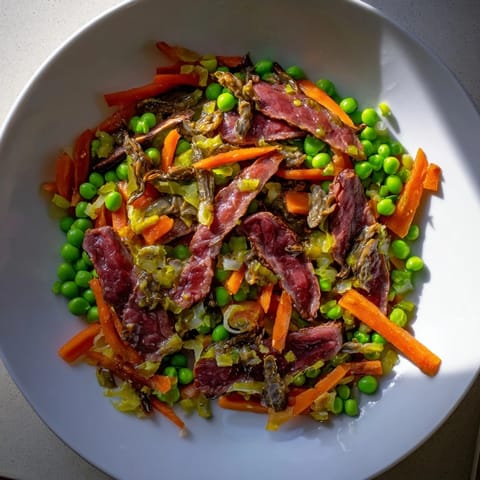 Tender beef and crisp veggies in a flavorful Skillet Beef Stir-Fry, perfect for a quick dinner.